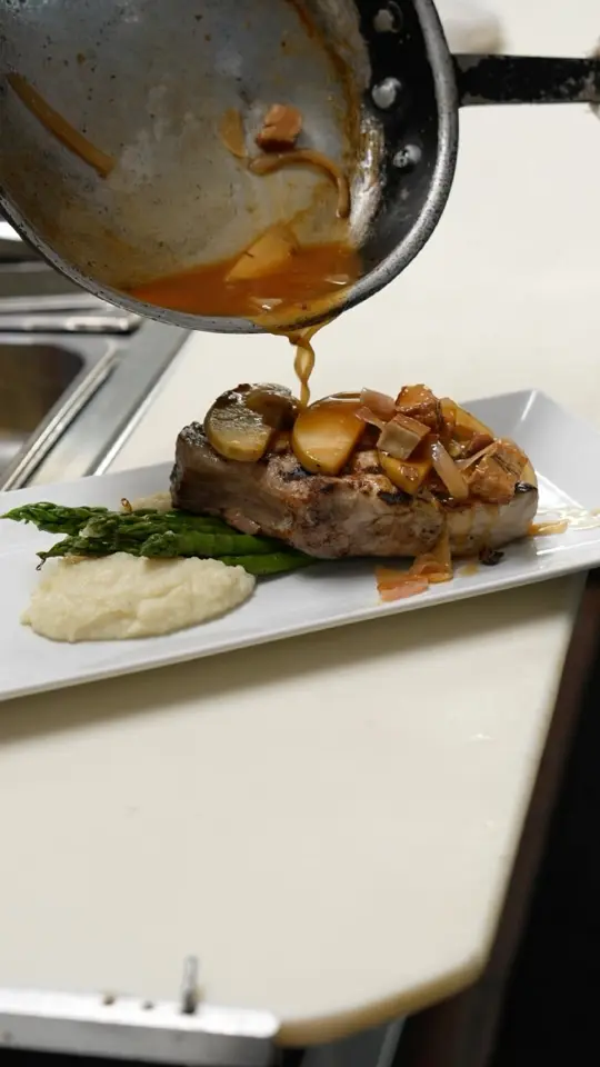 La Tavola Restaurant and Bar in Marco Island showing pork chop, dish, food, video by La Tavola Restaurant and Bar on Facebook
