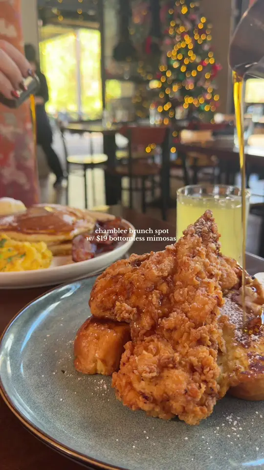 Lagarde American Eatery in Chamblee showing brunch, bottomless mimosas, orange juice, peach and strawberry, video by madoleapproved on TikTok