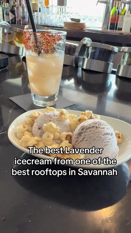Lavender Rooftop Kitchen & Bar in Savannah showing cocktail, lavender martini / food, mediterranean-inspired bites / atmosphere, rooftop views / visit, date night, video by kaylawiththekeyz on TikTok