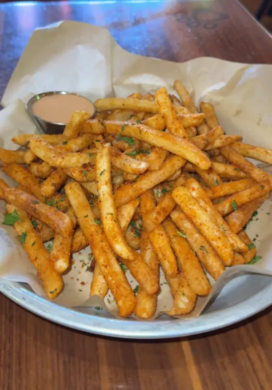 Lazy Dog Restaurant & Bar in Boca Raton showing french fries, classic fries, cajun fries, umami fries, video by lazydogrestaurants on TikTok