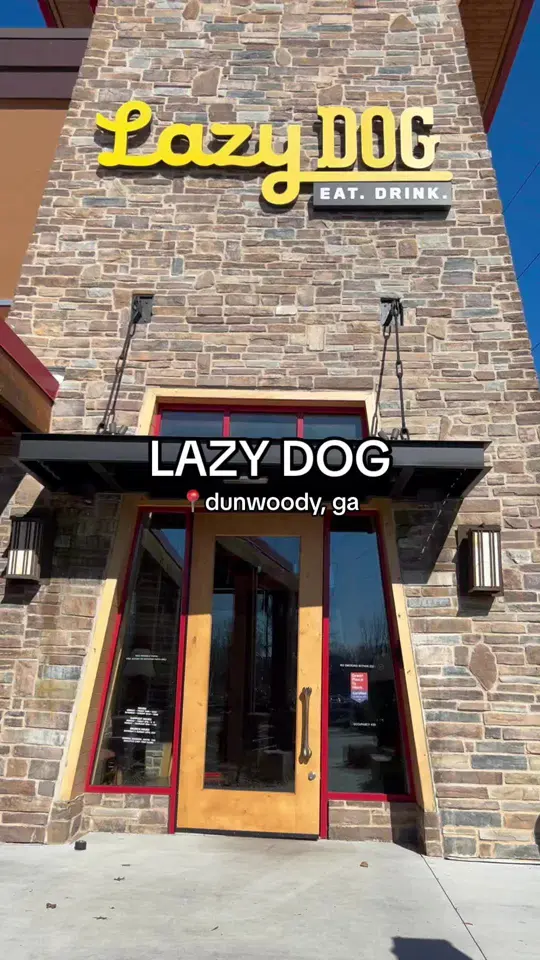 Lazy Dog Restaurant & Bar in Dunwoody showing food, bacon cheddar biscuits, fish and chips, chicken parmesan, video by cheapeatsatl on TikTok
