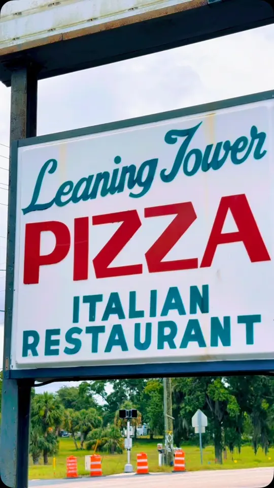 Leaning Tower of Pizza in New Port Richey showing pizza, visit, video by Downtown New Port Richey on Facebook