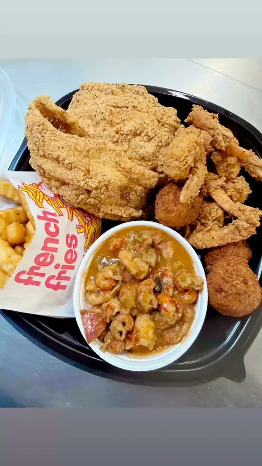 Lee's Southern Kitchen in Dallas showing food, louisiana platter, video by Lee's Southern Kitchen on Facebook