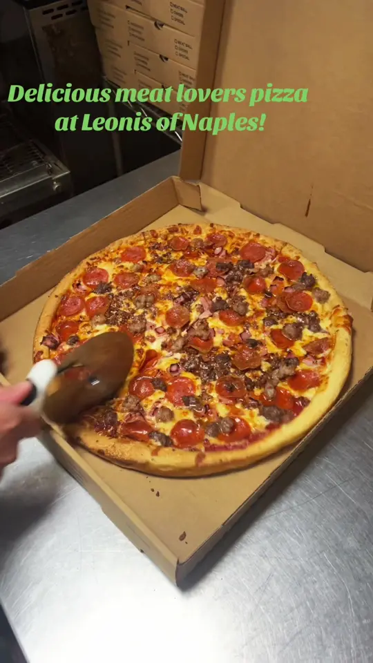 Leoni's Pizzeria in Fort Myers showing pizza, 14 inch 2 topping pizza, video by leonispizzeria on TikTok