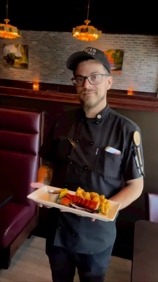 Lewis Prime Grill in Loxahatchee showing upscale dining experience, classic décor, high-back booths, full bar, classic and elevated appetizers, salads, fish, pork dishes, video by eatlocalflorida on TikTok