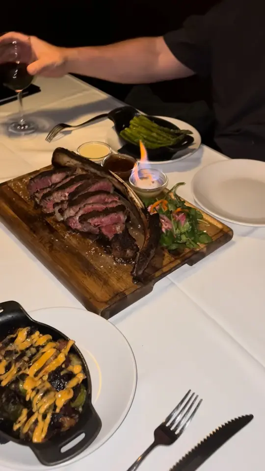 Lewis Steakhouse in Jupiter showing theatre meets dinner, flaming butter tableside, video by Lewis Steakhouse on Facebook