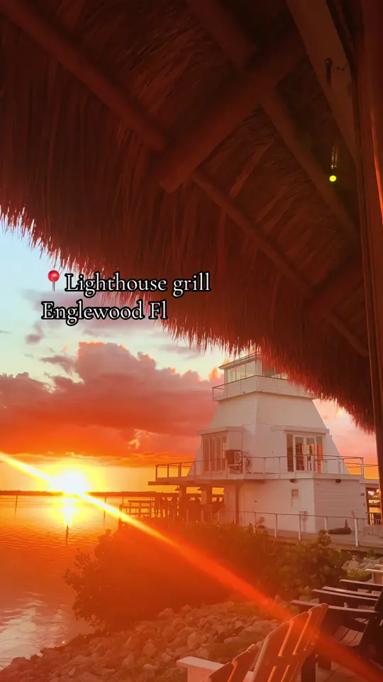 Lighthouse Grill and Tiki Bar in Englewood showing cocktail, sunset, video by lighthousegrilltikibar on TikTok