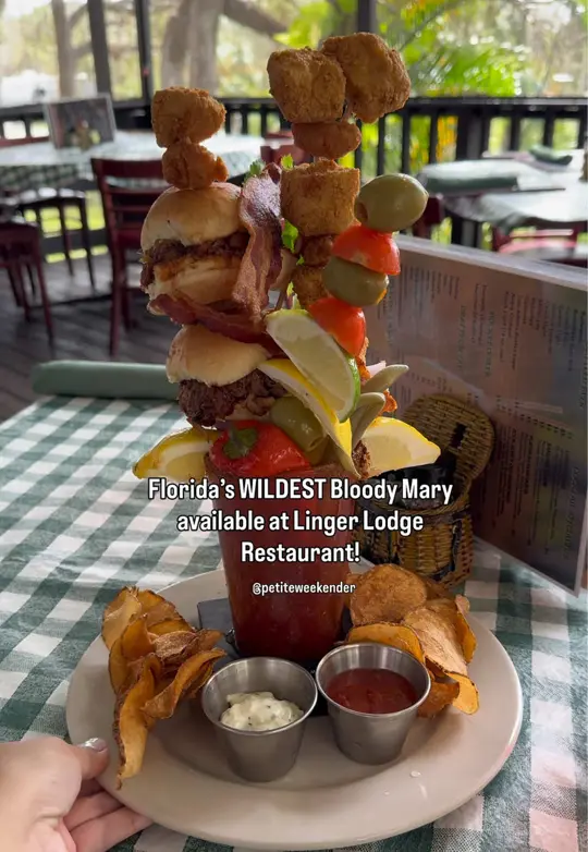 Linger Lodge Restaurant & Bar in Bradenton showing drink, bloody mary, food, pork sliders, fried shrimp, cod bites, video by petiteweekender on TikTok