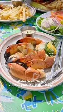 Little Bar Restaurant in Goodland showing fresh seafood, waterfront views, old florida charm, video by Naples, Marco Island, Everglades Florida on YouTube