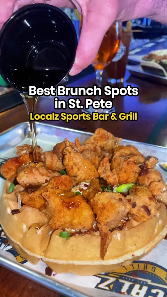Localz Sports Bar in St. Petersburg showing brunch, stuffed pb & j french toast, southern fried chicken & waffle, localz breakfast bowl, localz bloody mary, video by I Love the Burg St. Pete on Facebook
