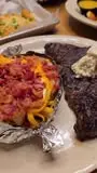 Logan's Roadhouse in Dalton showing steak, fresh sides, family night out, casual dinner, video by Logan's Roadhouse on Facebook
