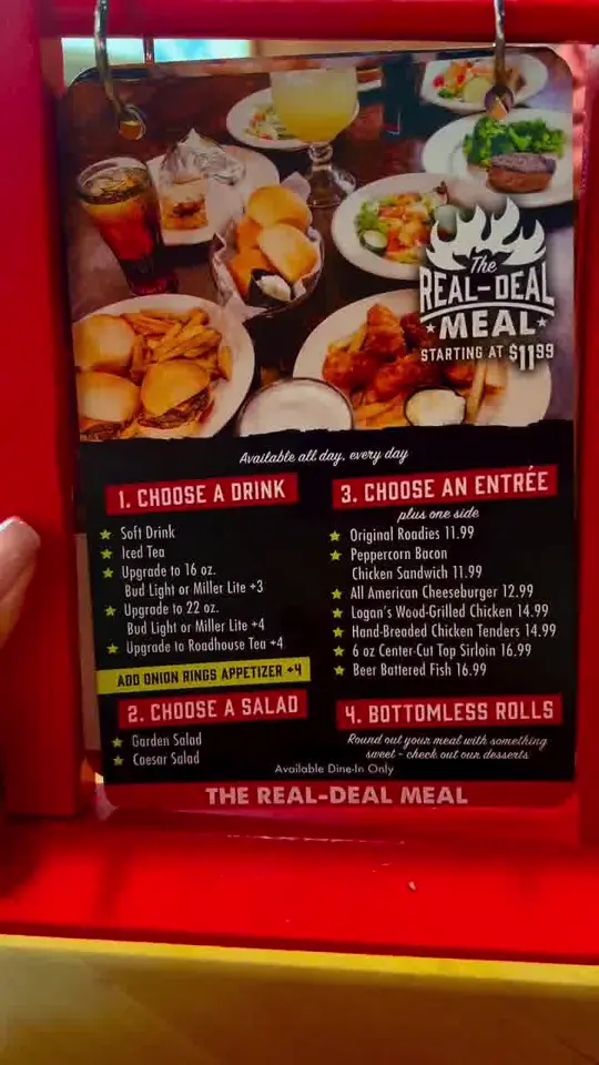 Logan's Roadhouse in Fort Myers showing meal, real deal meal, entrée, side salad, side, soda, made-from-scratch rolls, video by Logan's Roadhouse on Facebook