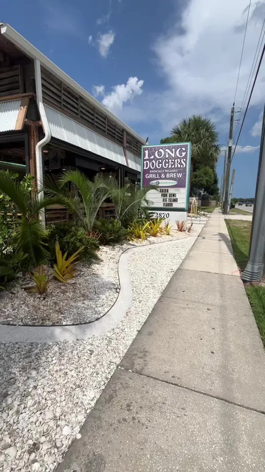 Long Doggers in Cocoa Beach showing review, community atmosphere, video by soldbymontague on TikTok