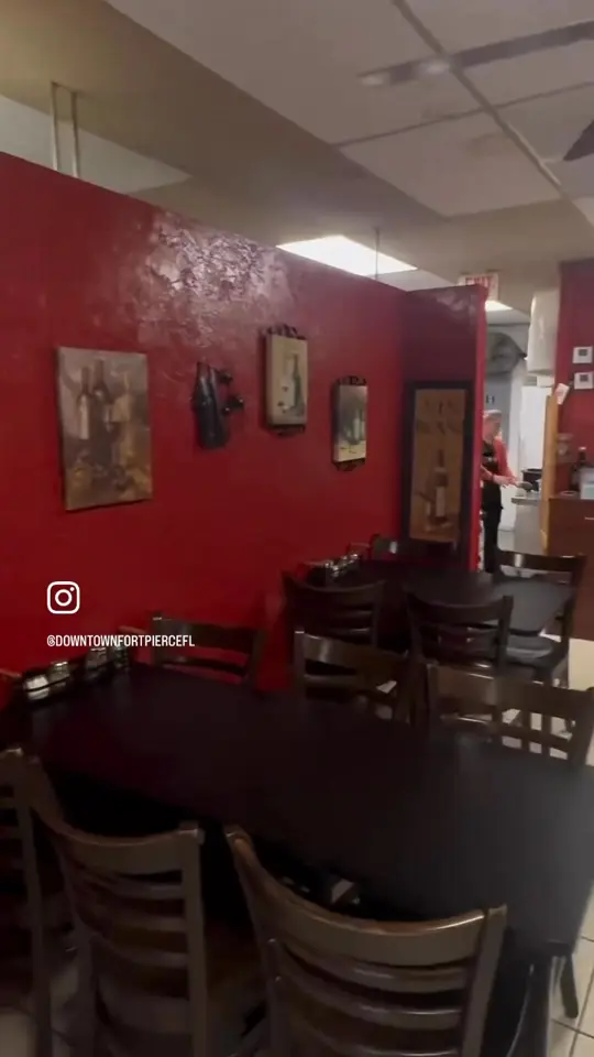 Lorenzo's Italian Restaurant & Pizzeria in Fort Pierce showing italian food, pizza, cozy vibes, atmosphere, visit, video by Downtown Fort Pierce, FL on Facebook