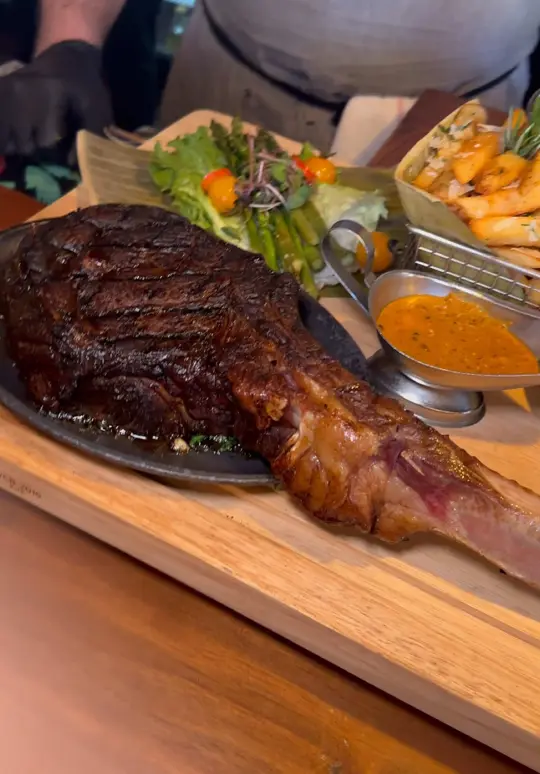 Los Andes Restaurant- Ponte Vedra in Jacksonville Beach showing dinner, tomahawk steak, video by chefcesin on TikTok