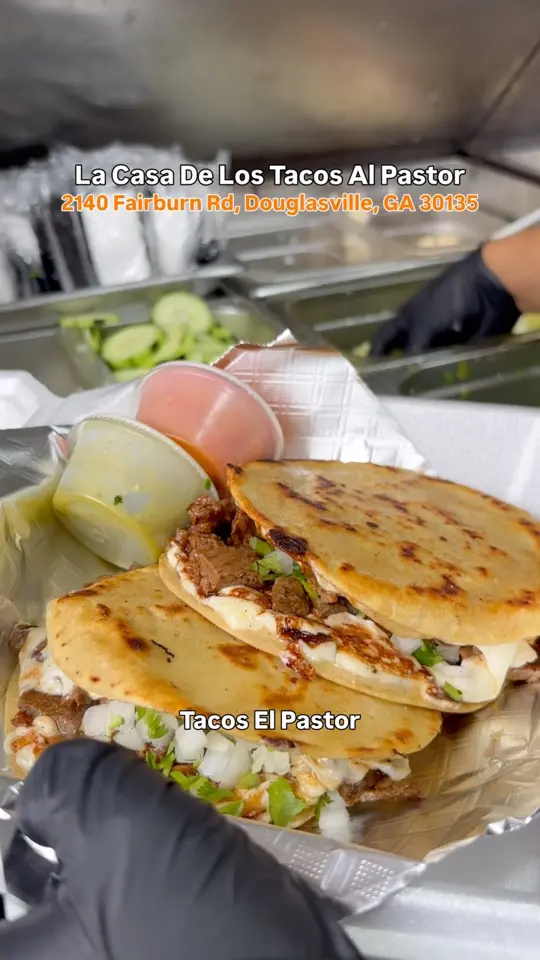 Los Tacos in Douglasville showing mexican food, tacos de pastor, video by La casa de los tacos de pastor on Facebook