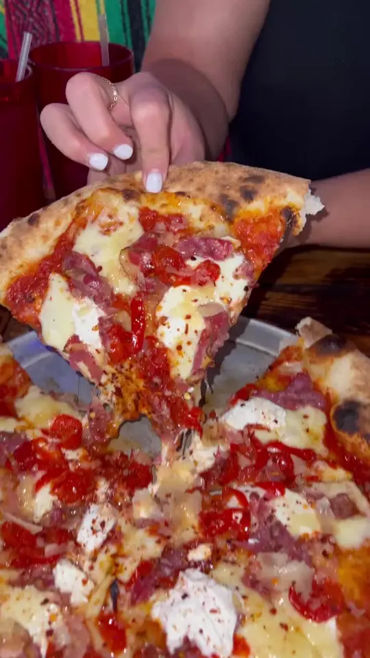  in Florida showing spicy pizza, caesar salad, diet coke, video by sunnycoastblog on TikTok