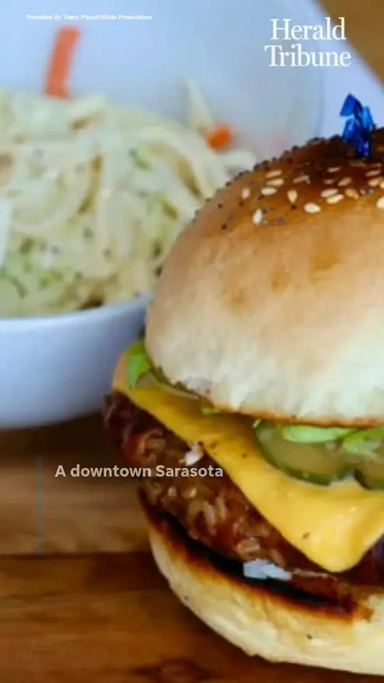 Lucile Pizza & Wine Bar in Sarasota showing lunch, sandwiches, smokehouse burger, fried fish, video by Sarasota Herald-Tribune on Facebook
