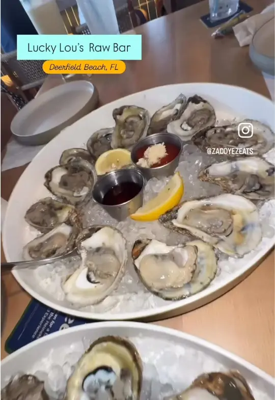Lucky Lou's Raw Bar in Deerfield Beach showing cocktail, happy hour, video by zaddyezeats on TikTok