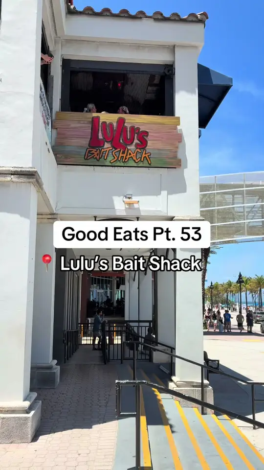 Lulu's Bait Shack in Fort Lauderdale showing review, visit, fishbowl drink, frozen cocktails, fresh mozzarella, pub burger, video by ravebaeeats on TikTok