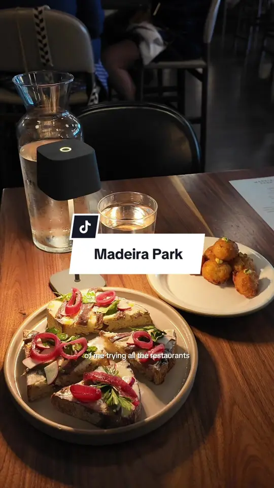 Madeira Park in Atlanta showing food review, butter + anchovy tartine, ham + cheese beignets, video by grace.jjang on TikTok