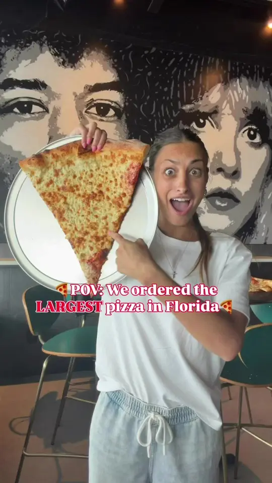  in Florida showing pizza, largest pizza in florida, half white pie, half cheese pie, video by stufftodointb on TikTok