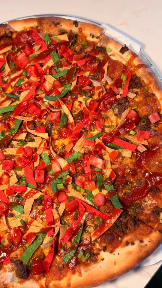  in Florida showing mexican pizza, taco, video by Madison Avenue Pizza on Facebook