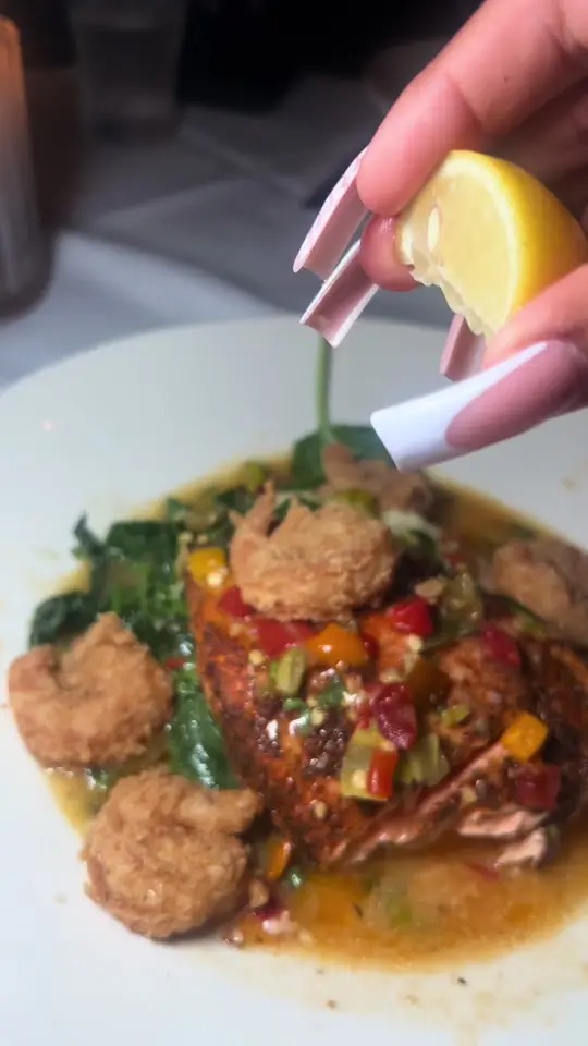 Maggiano's Little Italy in Atlanta showing food, blackened salmon with crispy calabrian shrimp, video by atl.yummyeats on TikTok