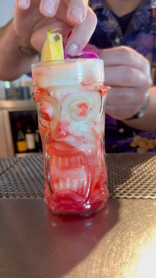 Mai Tai Bar in Daytona Beach showing drink, lava flow cocktail, video by Mai Tai Bar Daytona Beach on Facebook