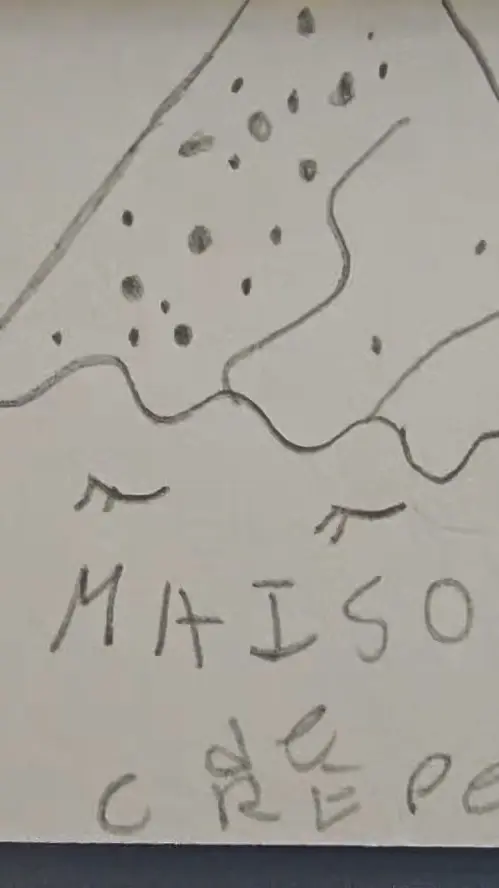 Maison de Crêpes in LaGrange showing atmosphere, handwritten notes, reviews, wall decor, video by Maison de Crêpes on Facebook