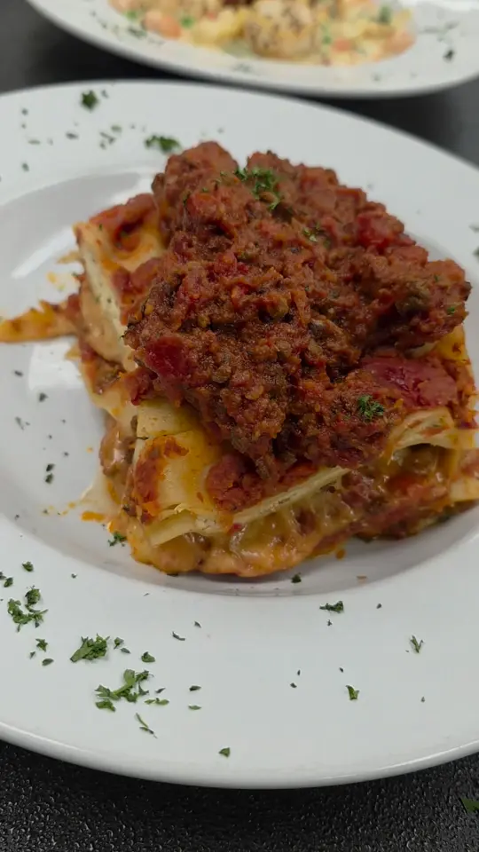 Mama Lucia's Restaurant in Newnan showing food, lasagna, video by Mama Lucia's on Facebook