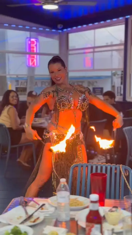 Mama's Greek Cuisine in Tarpon Springs showing live music, belly dancing, homemade greek cuisine, family atmosphere, video by Mama's Greek Cuisine on Facebook