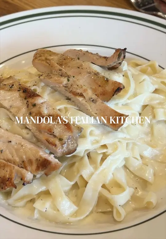 Mandola's Italian Kitchen in Riverview showing review, wood-fired pizza, chicken parm, homemade mozzarella, frozen sangria, penne alla vodka, video by aleiastraveldiary on TikTok