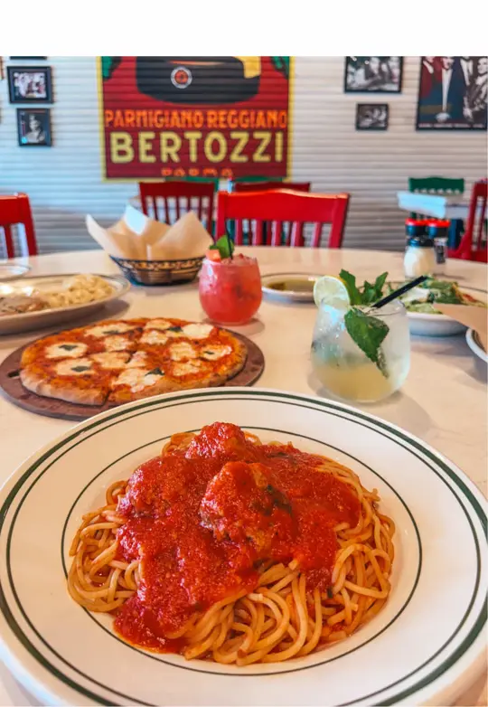 Mandolas Italian Kitchen in Odessa showing food, chicken piccata with fettuccine alfredo / spaghetti and meatballs / margherita pizza / mista salad / garlic fries / peanut butter and stracciatella gel, video by guidedbydestiny on TikTok