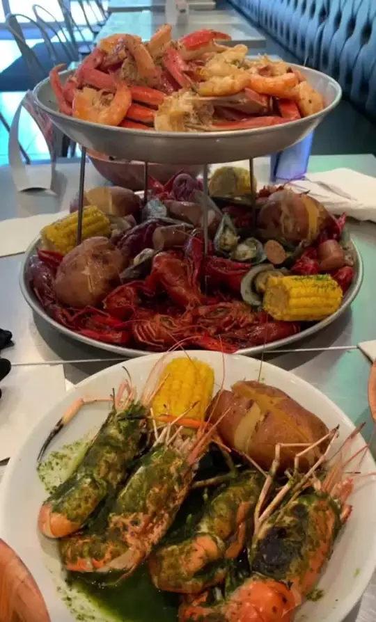 Mariscos La Riviera Nayarit in Norcross showing seafood, jumbo spicy grill prawns, video by eaternallyhappy on TikTok