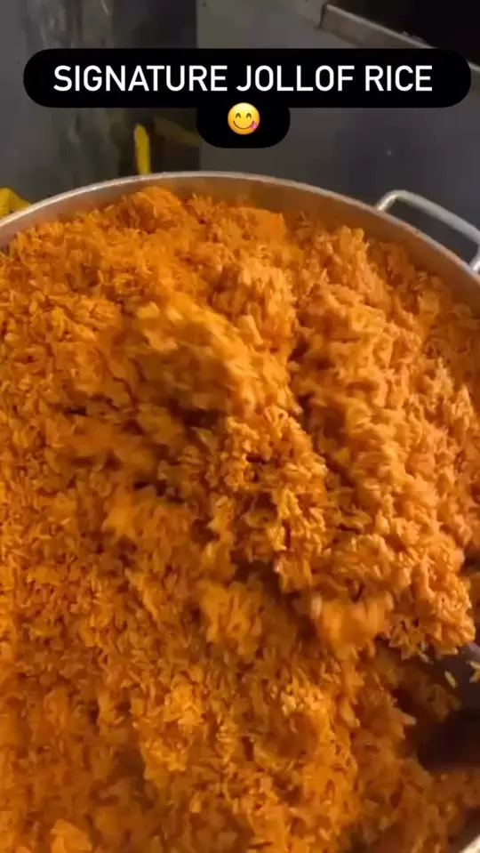 MASSA AFRICAN RESTAURANT in Hinesville showing jollof rice, signature dish, video by Massa African Restaurant on Facebook