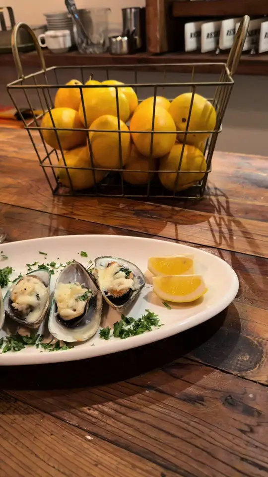 Mazzi Cucina - Italian Restaurant in North Miami Beach showing food, baked mussels with parmesan and mozzarella, video by mazzicucina on TikTok