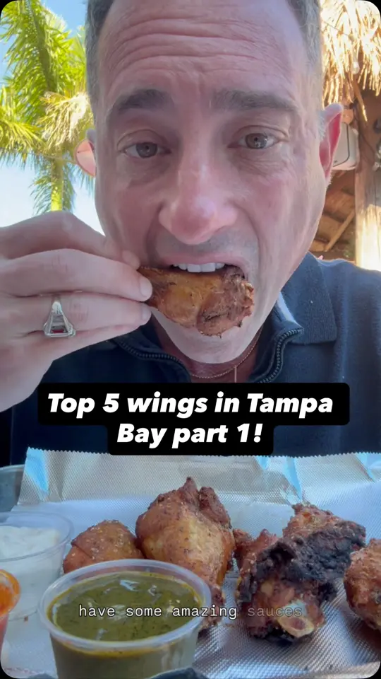 McDivot's Sports Bar and Restaurant in Tampa showing chicken wings, video by Foodie Justice on Facebook