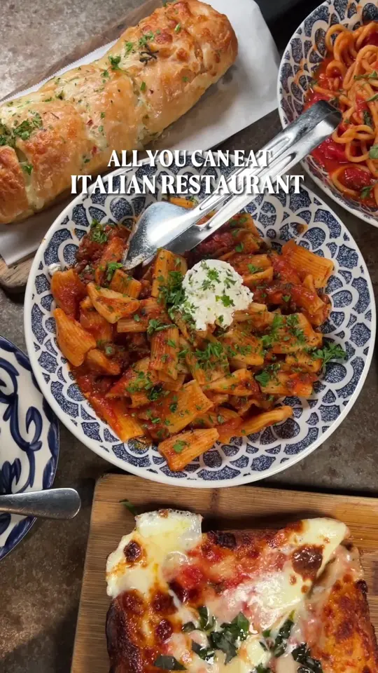 Mia's Italian Kitchen in Orlando showing italian food, all you can eat, video by explorewithgg on TikTok