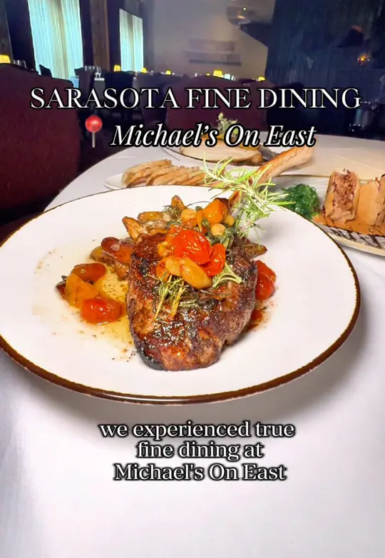 Michael's On East in Sarasota showing fine dining, live piano, terri’s filet mignon tartare, grilled tuscan provimi tomahawk veal chop, pan-seared greek style branzino, video by eatlocalflorida on TikTok