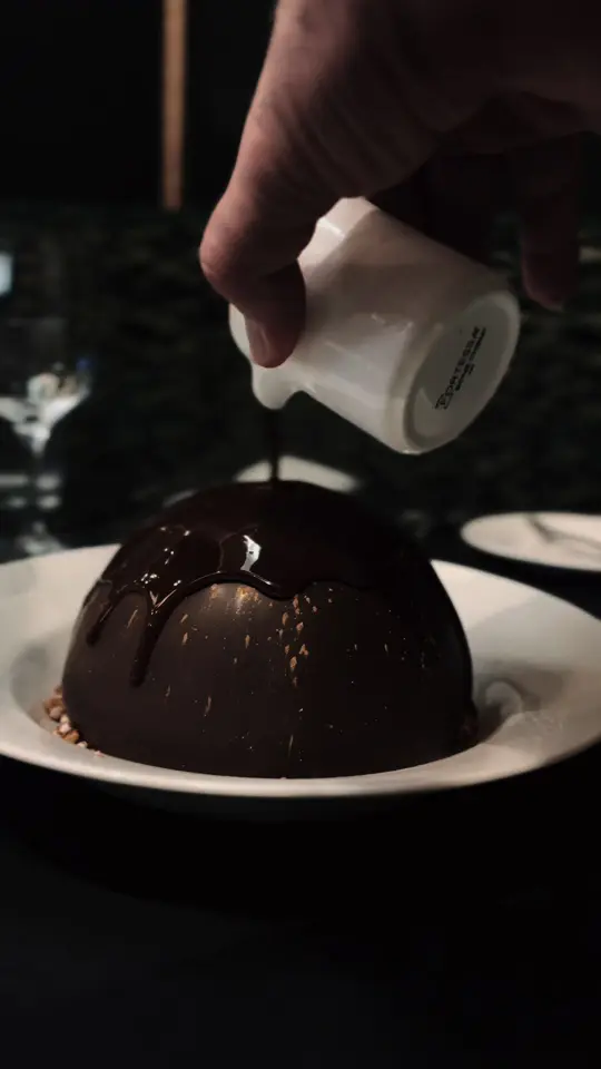 Michael's On East in Sarasota showing dessert, chocolate dome, video by michaels.on.east on TikTok