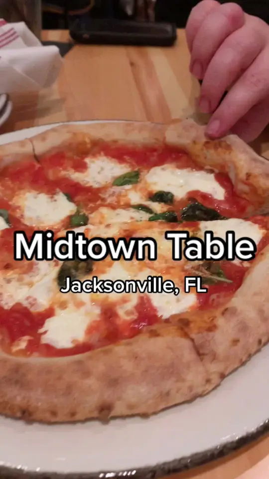 Midtown Table in Jacksonville showing pizza, video by snaxsonville on TikTok