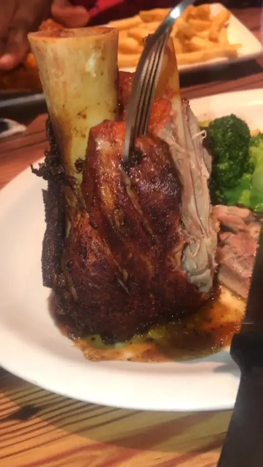 Miller's Ale House in McDonough showing food, pork osso buco, video by hustlemom on TikTok