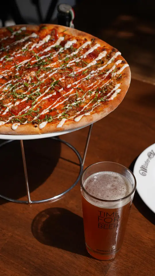 Mister O1 Extraordinary Pizza - Bay Harbor in Bay Harbor Islands showing pizza, spicy salami calabrese, italian sausage, honey, ranch dressing, spicy black truffle seasoning, video by Mister O1 Extraordinary Pizza on Facebook