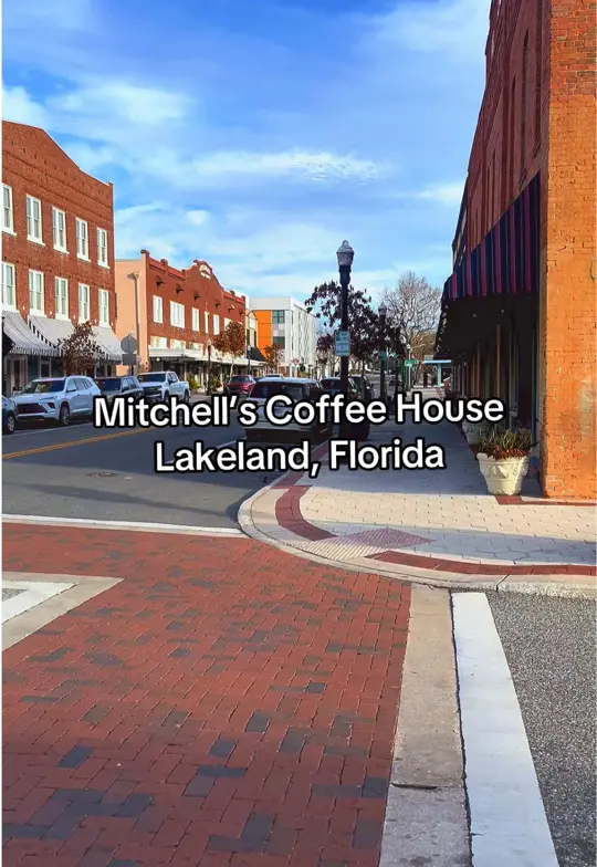 Mitchell's Coffee House in Lakeland showing review, visit, coffee, seasonal valentine’s day frappe, pastries, giant coffee cake, cinnamon roll, video by moorecake17 on TikTok