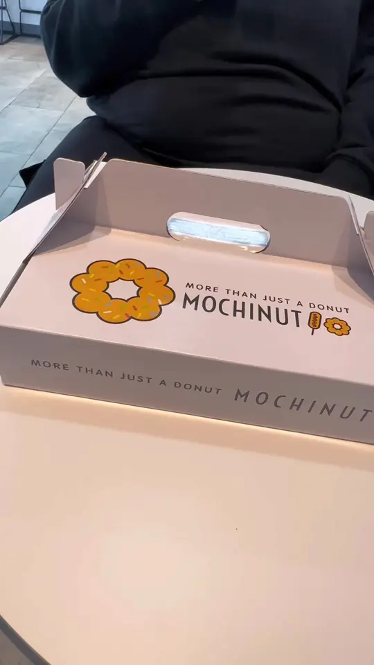 Mochinut in Orlando showing food review, mochi donuts, korean corn dogs, couples vlog, video by _tiamonique on TikTok