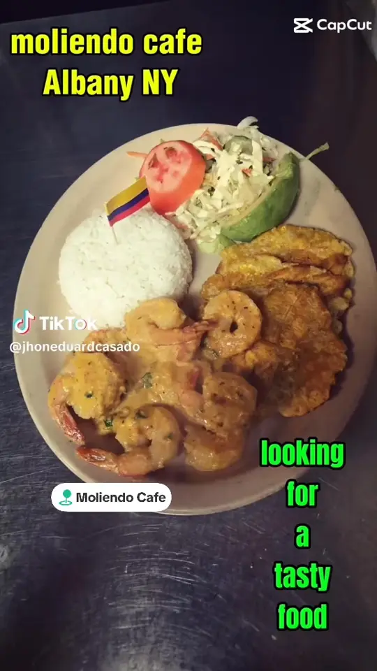 Moliendo Cafe in Albany showing visit, colombian food, video by Moliendo Café on Facebook