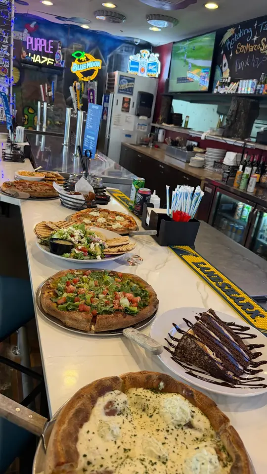 Moon Dog Pie House in St. Johns showing pizza, eat local, video by Moon Dog Pie House on Facebook
