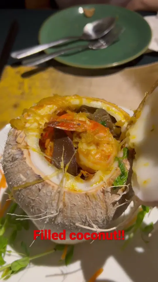  in Florida showing food, coconut filled with prawns, video by guitar singapore travels Rapture!  on YouTube