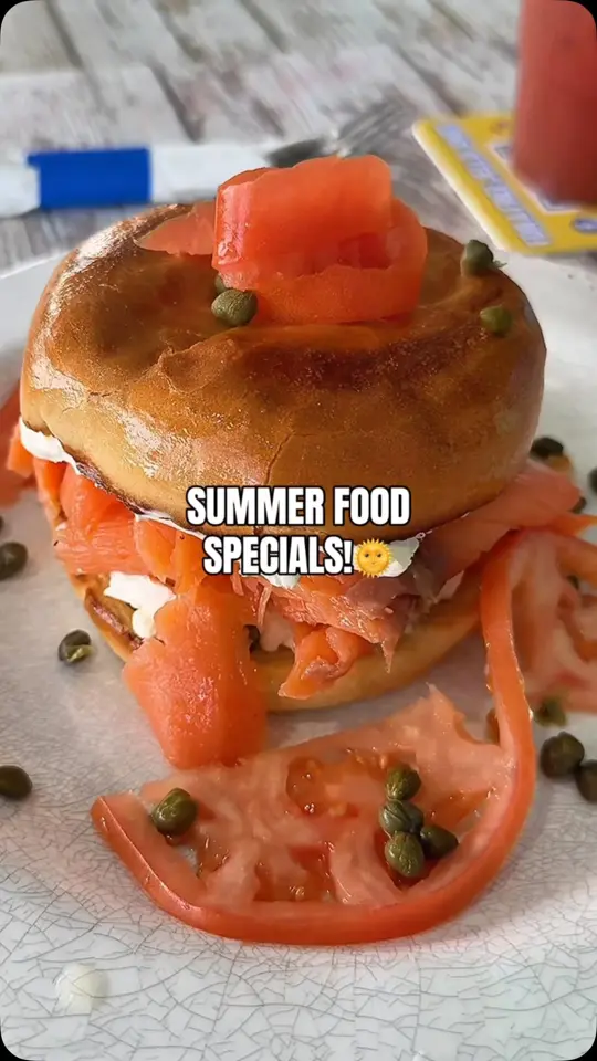 Mr. Waves Island Bar in Fort Myers Beach showing food, jumbo pretzel with warm cheese dips, loaded philly cheesesteak, smoked salmon bagel, eggs benedict, smash burger, video by Mr. Waves Island Bar on Facebook